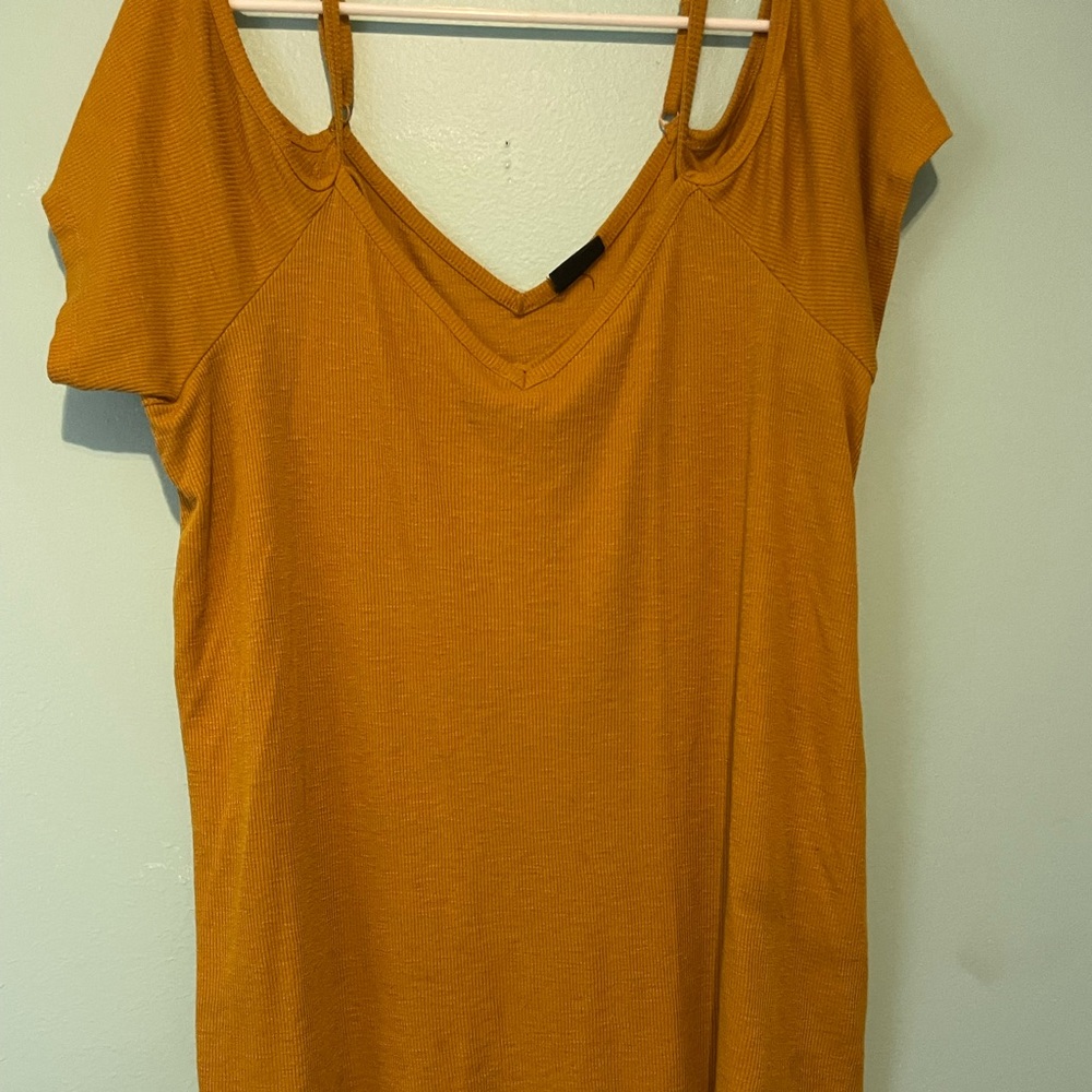 Burn orange, kind of off the shoulder high quality fabric.